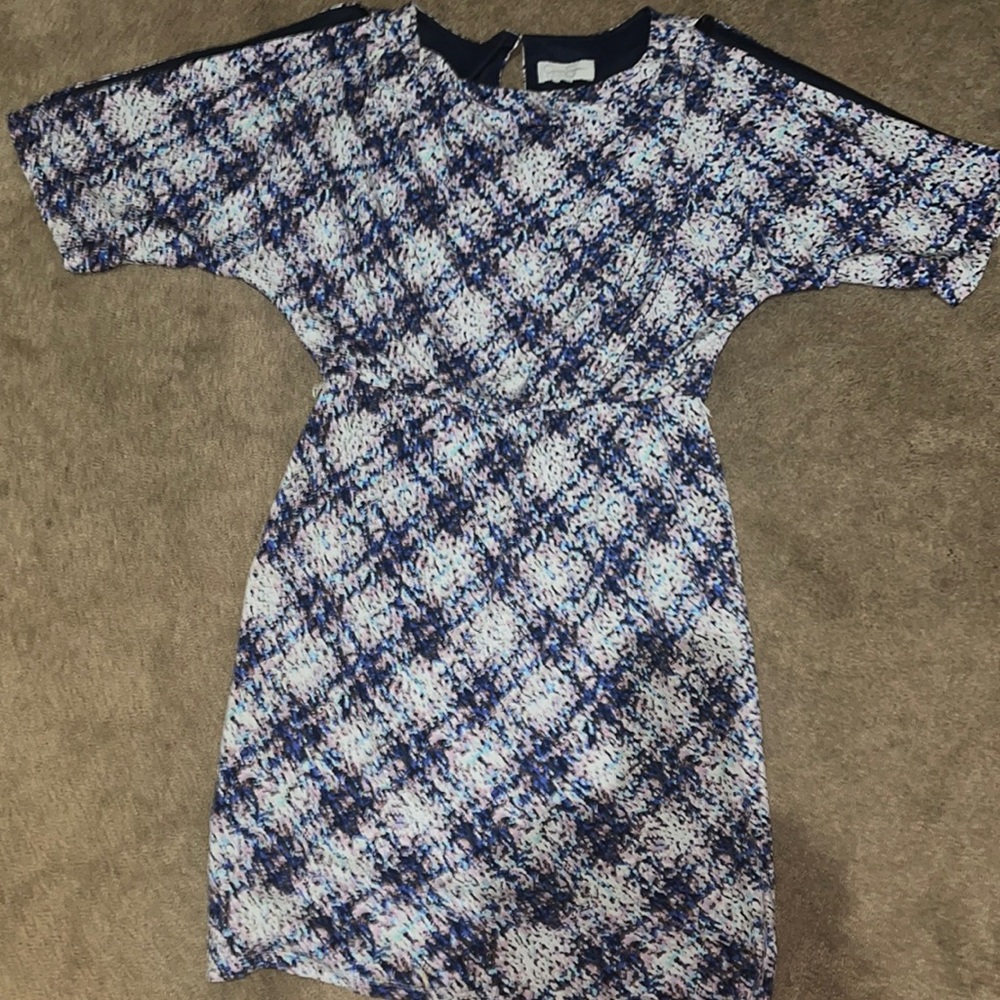 Jessica Simpson Dress with open slits that start on the shoulders.